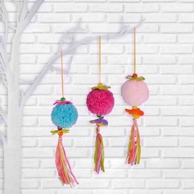 FUNKY-HANGING-POM-POM_FUNKY_HANGING_POM_POM_.jpeg